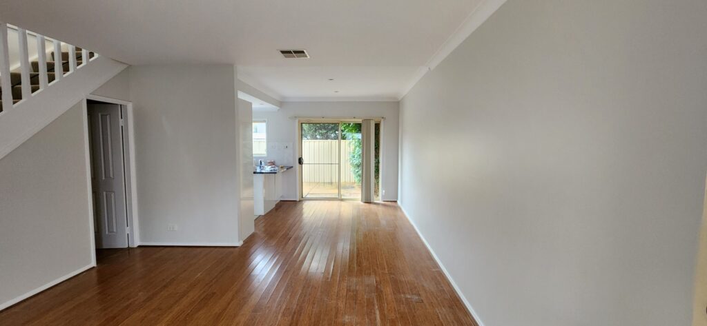 Interior living area freshly repainted in white by Procover Painting