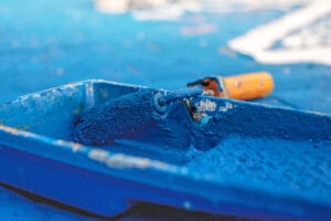 Painting Brush Dipped in Blue Color for Swimming Pool Painting