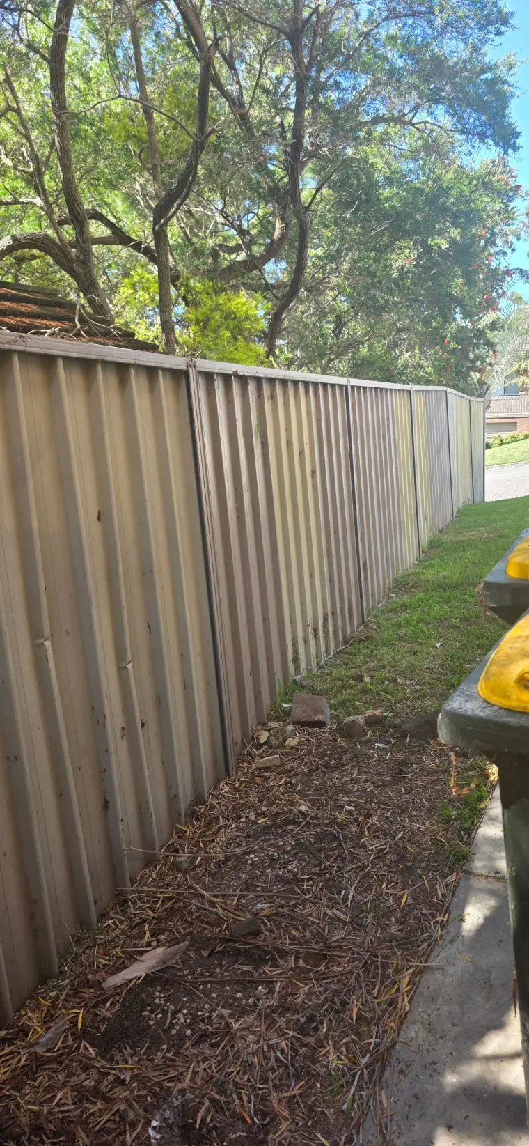 Faded Colorbond fence on the street side before painting